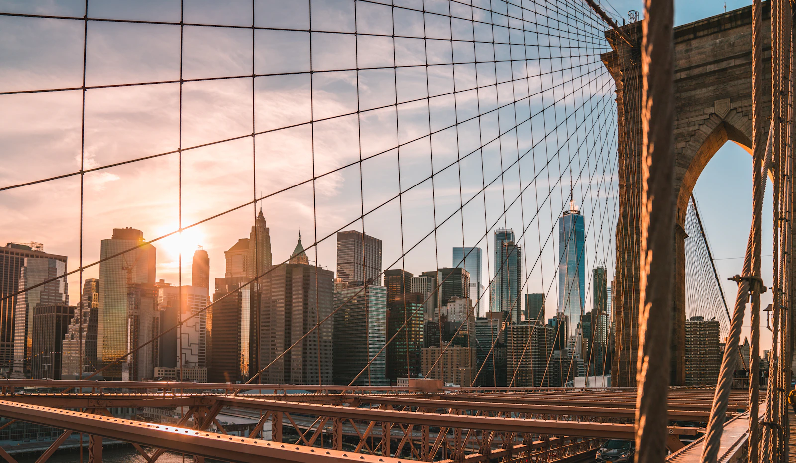 Lower Manhattan viewed through the cables of Brooklyn Bridge